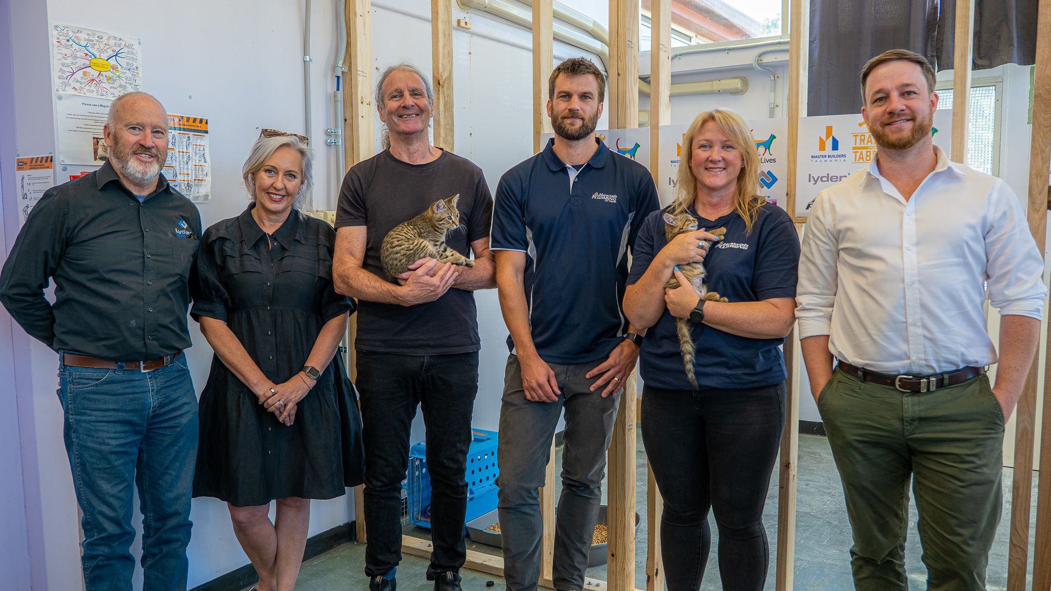 Tradies for Tabbies Launch: (L-R) Andrew Lyden of Lyden Builders, Ten Lives Ambassador Dave Noonan, x and Cathy McDowell of Howrah Plumbing and Matthew Pollock CEO Master Builders Tasmania